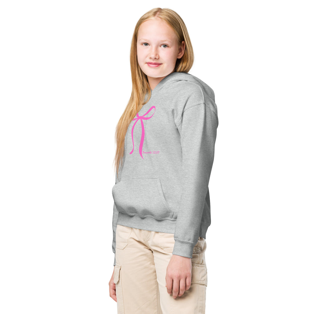Girl wearing sport grey girls Christian hoodie showing Proverbs 31:25 bow design on the front