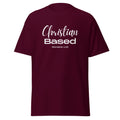 Maroon women’s Christian t-shirt lay flat front view with text Christian Based and Romans 1:16 in feminine handwritten and block fonts