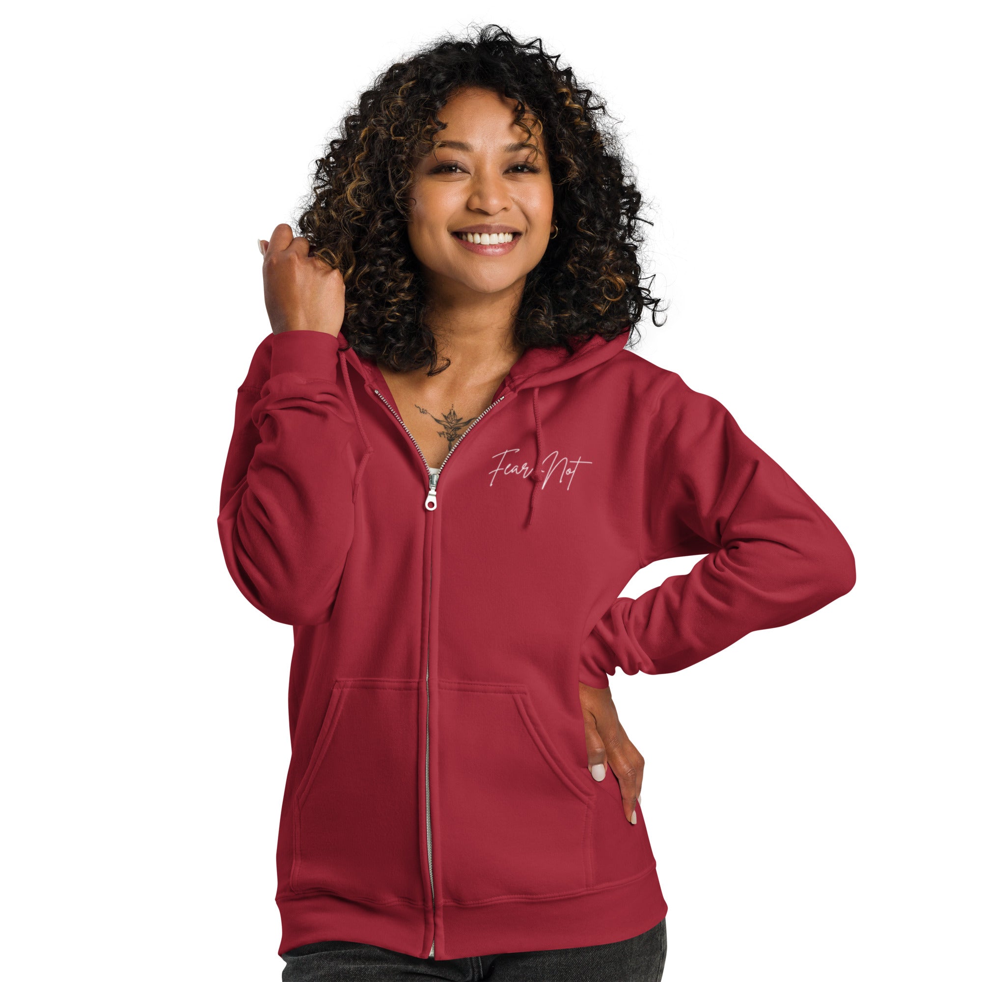 Close-up front view of female model wearing the women’s Christian zip hoodie in cardinal red showing left chest script text reading Fear Not
