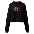 Flat lay front view of women’s Christian cropped hoodie in black featuring red script text “Merry Christmas” with snow accents, the “T” in Christmas designed as a cross, red script “Luke 2:11,” and Christmas flower accents.
