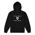 Kids Christian hoodie flat lay in black showing the front design text “Pray Hard” above a shield with a cross and the text “Play Hard” below in a gamer pixel font