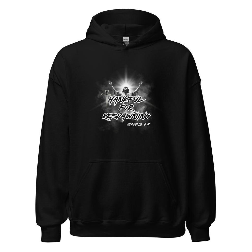 Men’s Christian hoodie in black featuring the front design text “Thankful for Respawning” and “Romans 6:9” in an urban style font, with the letter “t” in Thankful formed by three nails and an illustration of Jesus looking to Heaven with arms raised, light rays and clouds behind Him.